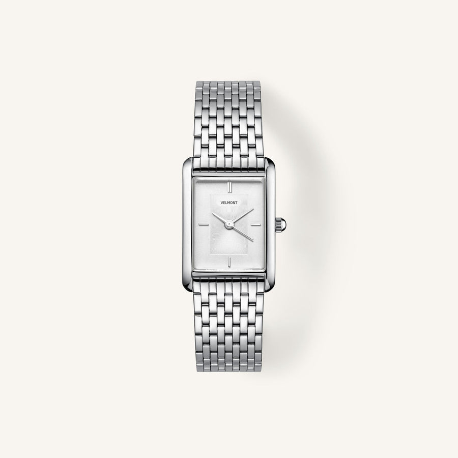 Silver-tone rectangular watch with white sunray dial, front view