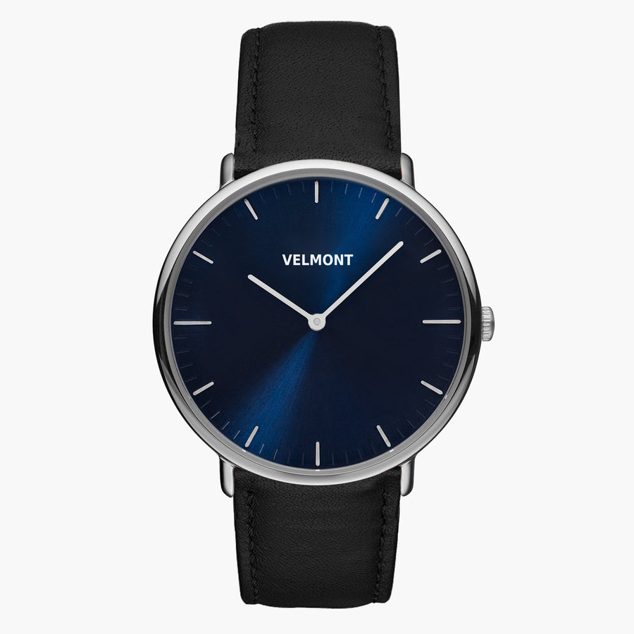 Watch with a blue sunburst dial and silver-tone case on a smooth black strap.