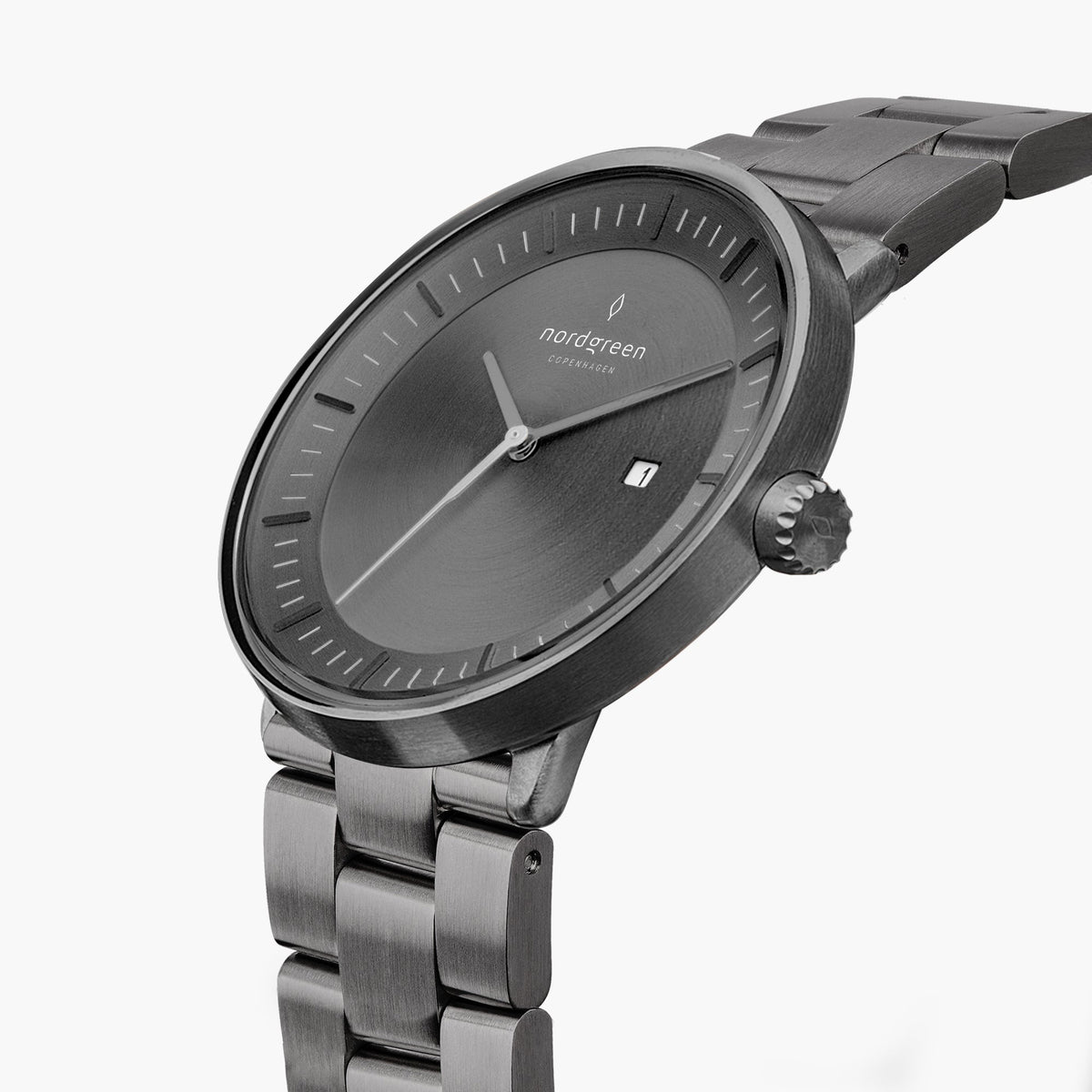 Angled view of the gray dial, date window and fluted gunmetal crown.