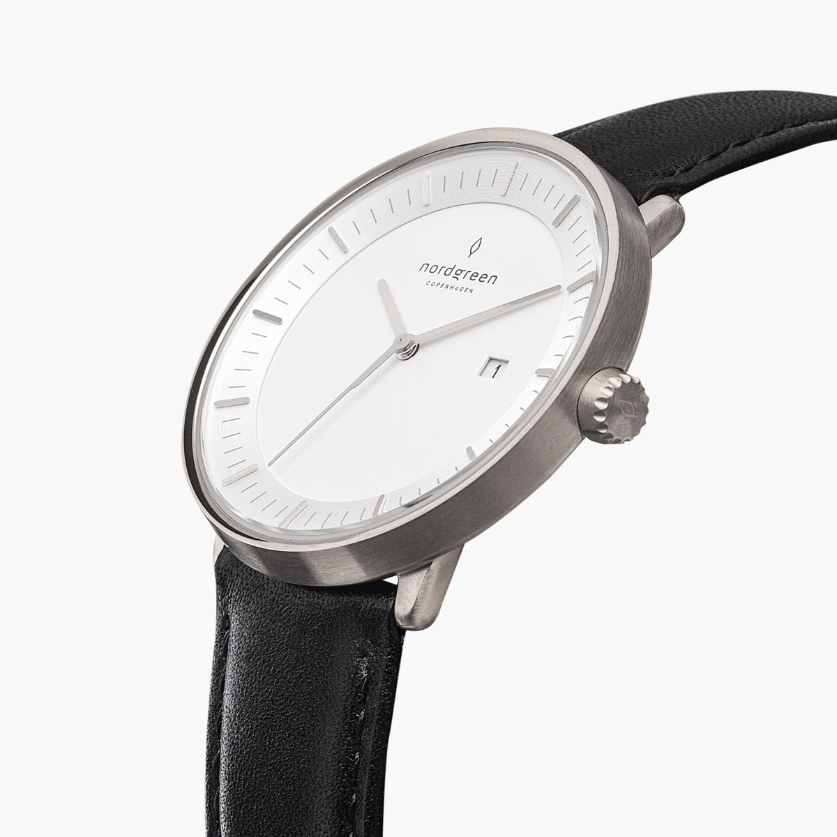 Angled view of the silver-tone case and white dial, crown on the right side.