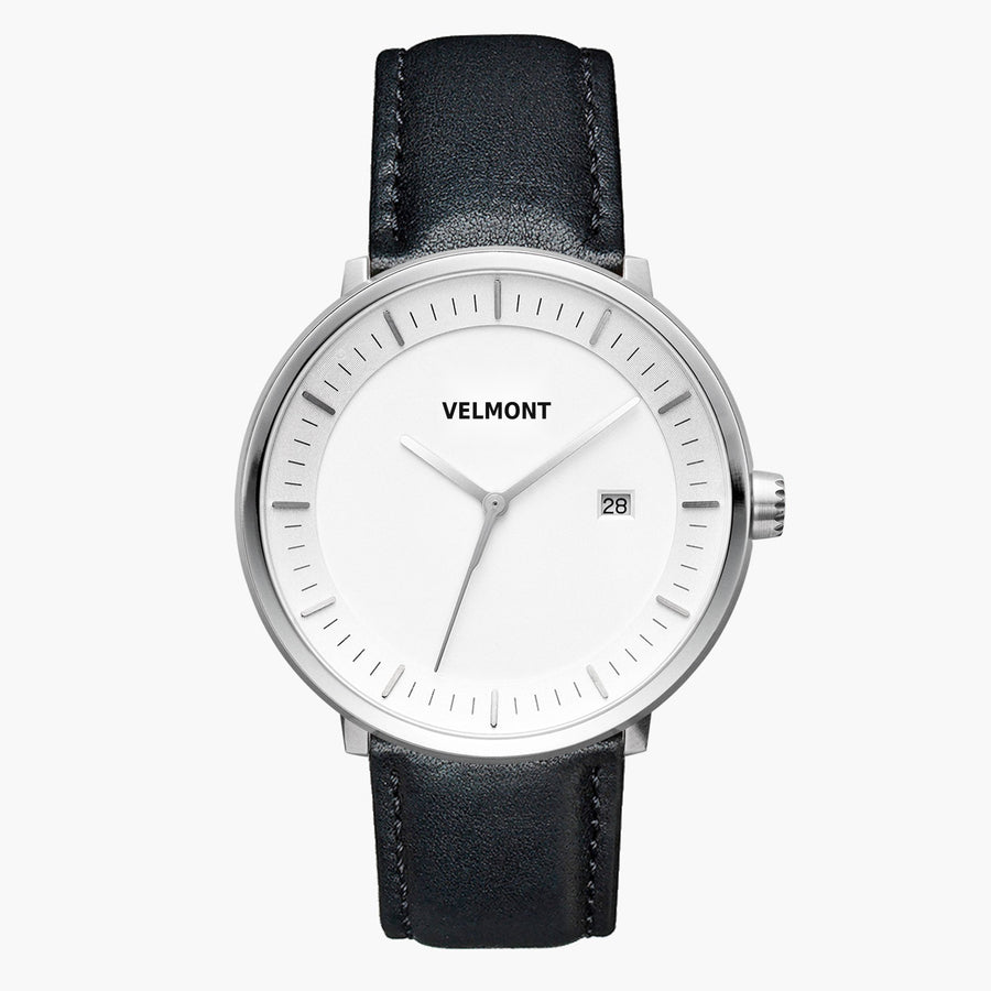 Straight-on look at the white dial and silver-tone case with its black strap.
