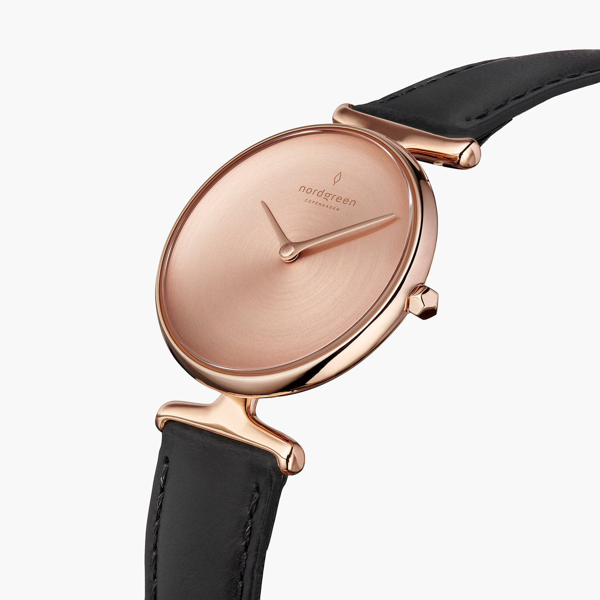 Angled view of the rose gold-tone dial, sculpted lugs and faceted crown.