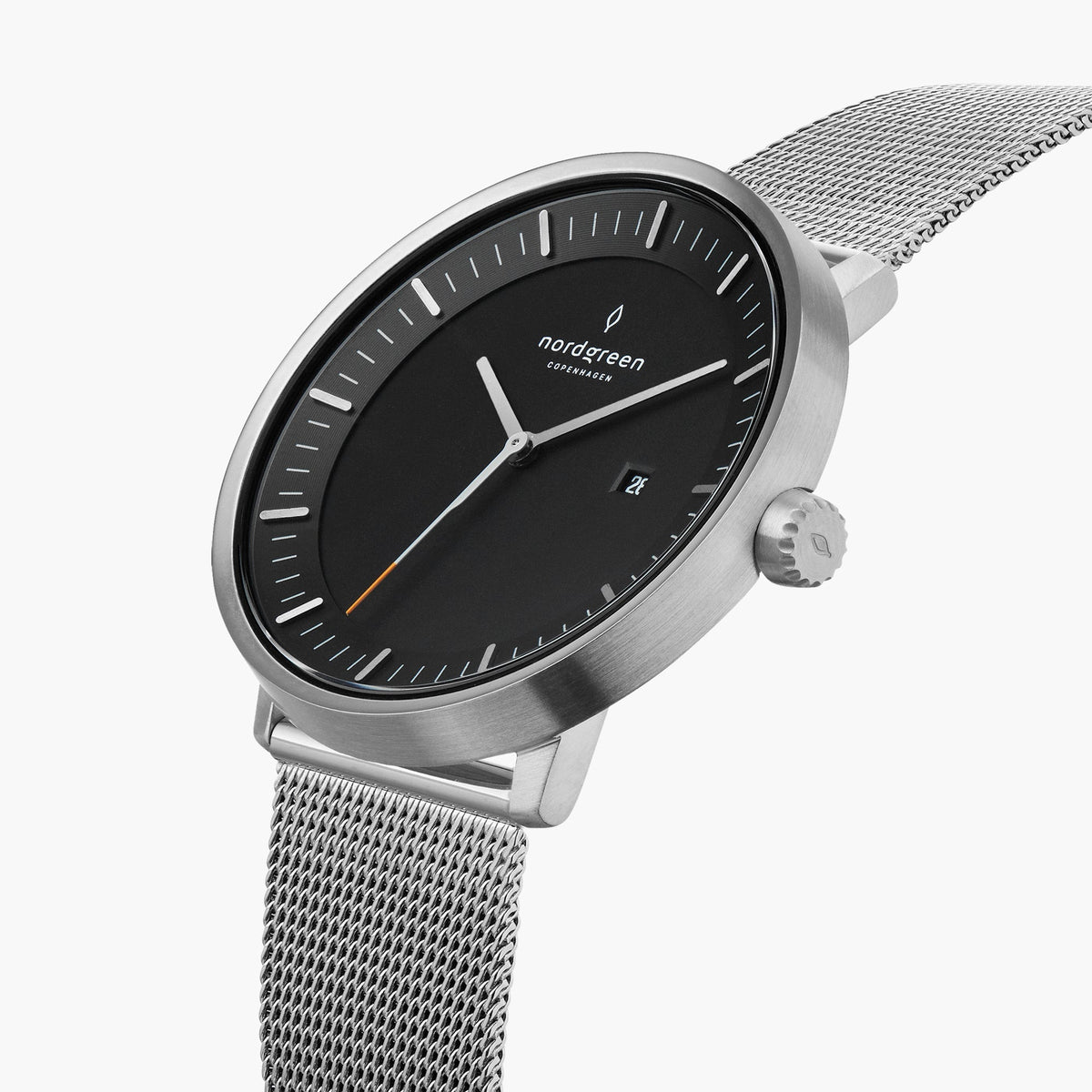 Three-quarter view of the watch showing the black dial and silver-tone mesh strap.