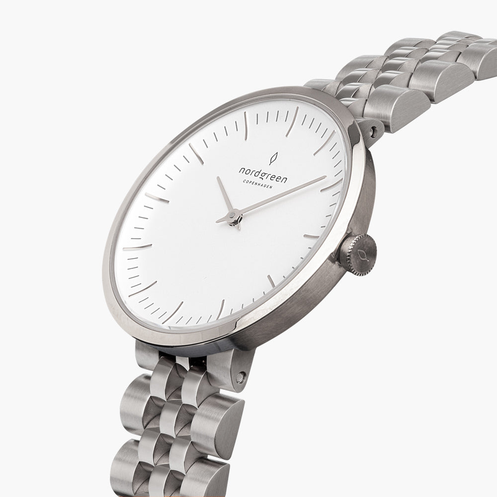 Angled view of the slim silver-tone case, crown and five-row bracelet.
