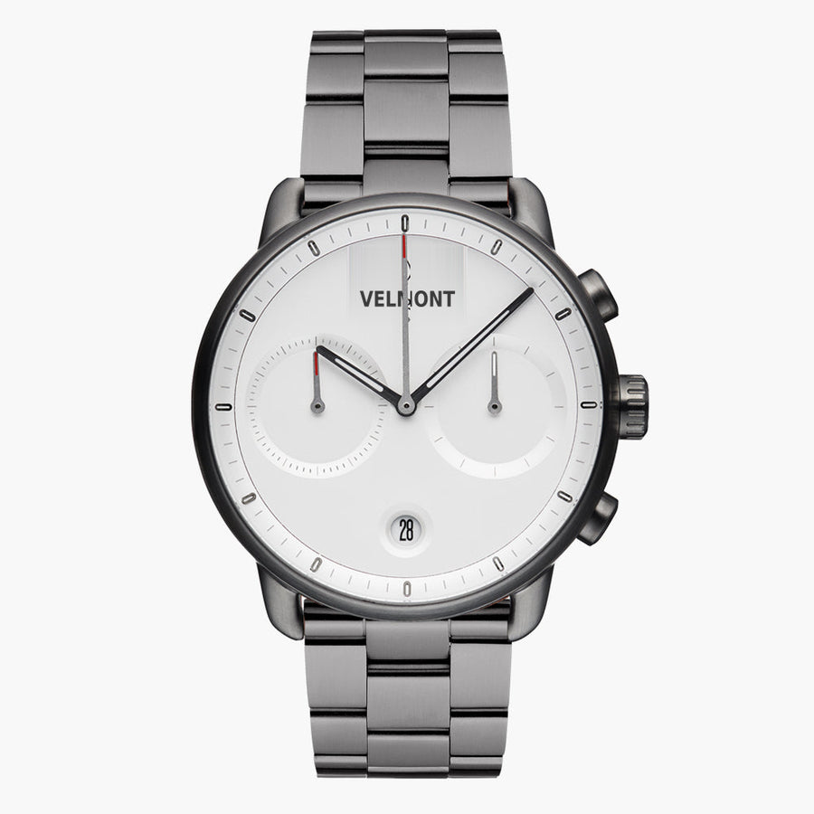 Chronograph-style watch with a white dial on a gunmetal link bracelet, front view.
