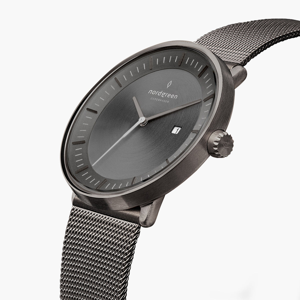 Three-quarter view of the watch showing the gunmetal gray sunburst dial and gunmetal mesh strap.
