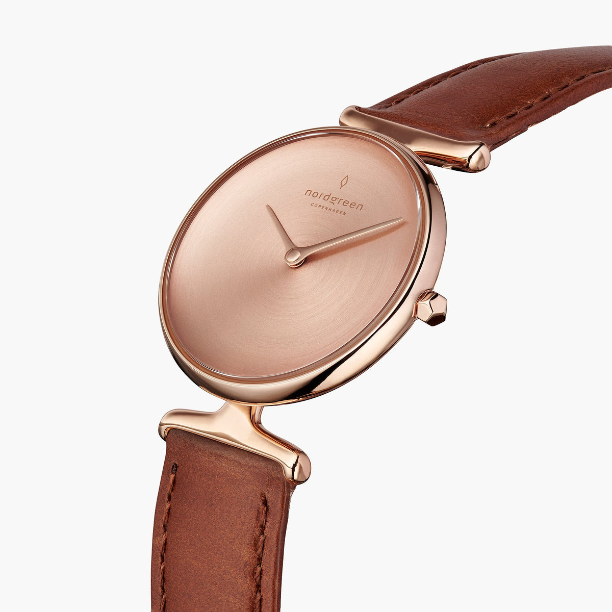 Angled view of the sculpted lugs and faceted crown in rose gold tone.