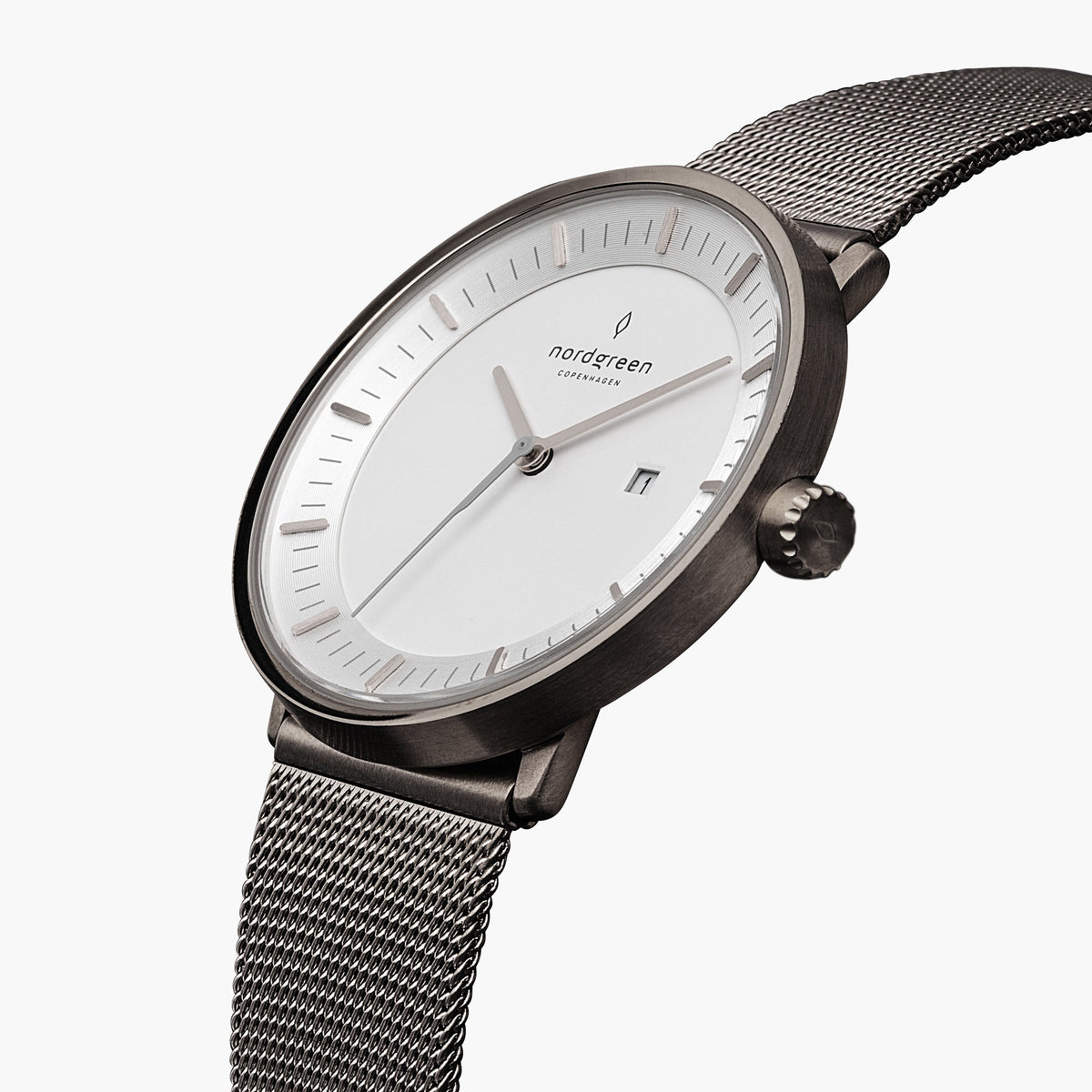 Angled view of the gunmetal case and white dial, crown on the right side.