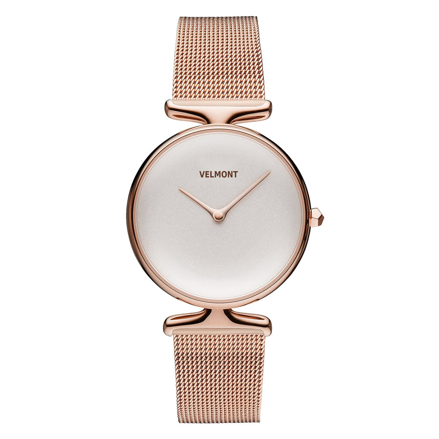 Minimalist watch with a soft white dial and rose gold-tone mesh strap, front view.