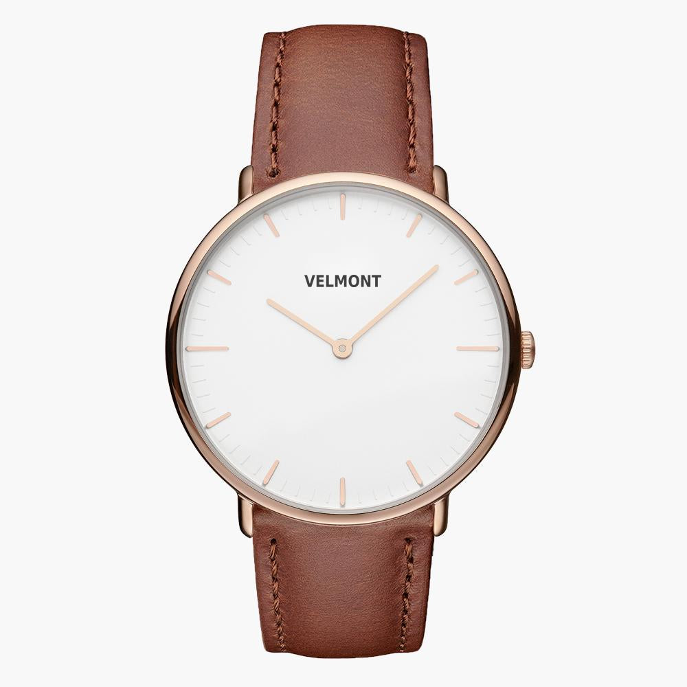 Rose gold-tone watch with a white dial on a brown strap, centered front view.