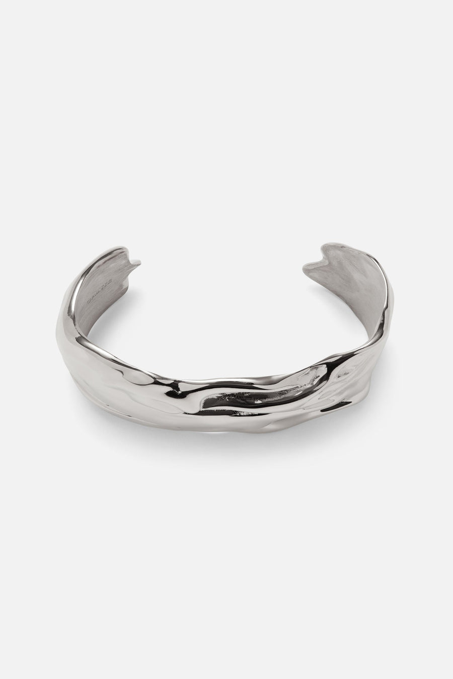 Silver-tone sculpted wave cuff bracelet, front view on a light background
