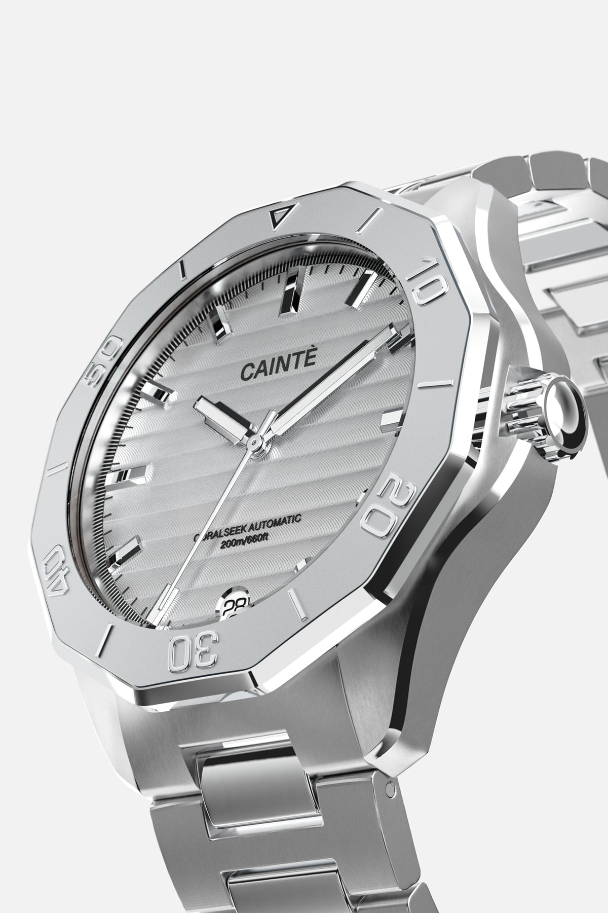 Three-quarter view of the faceted, numbered bezel and white dial