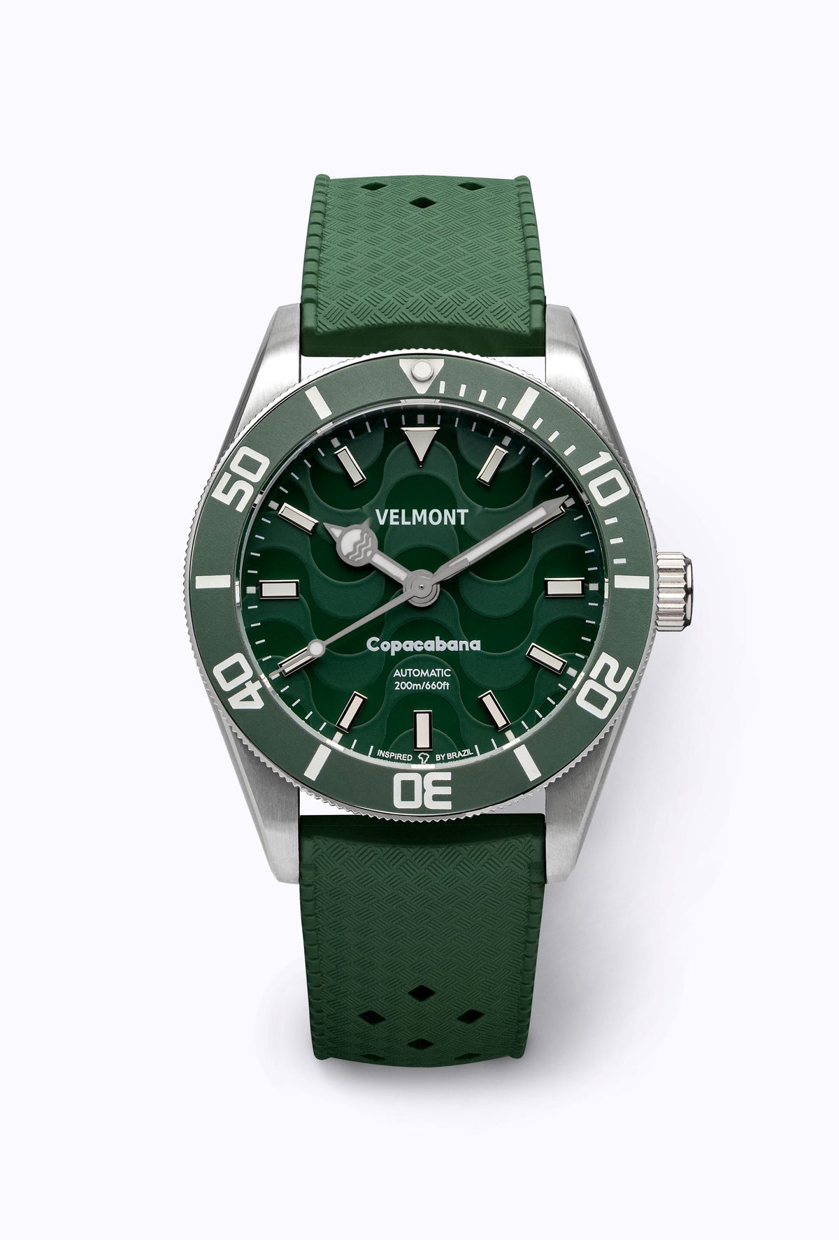 Green dial watch on a green perforated rubber strap