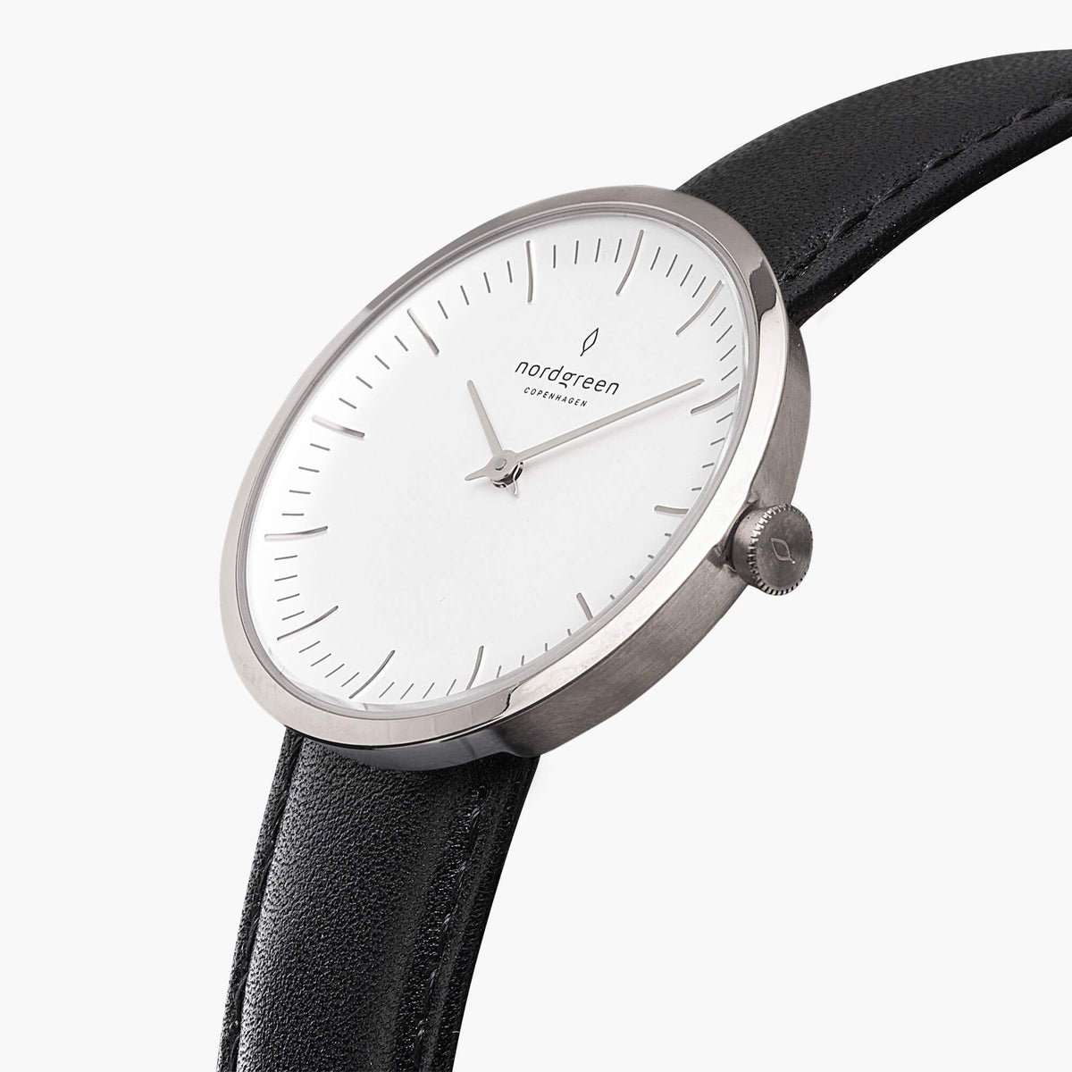 Angled view of the slim silver-tone case and two-hand white dial.