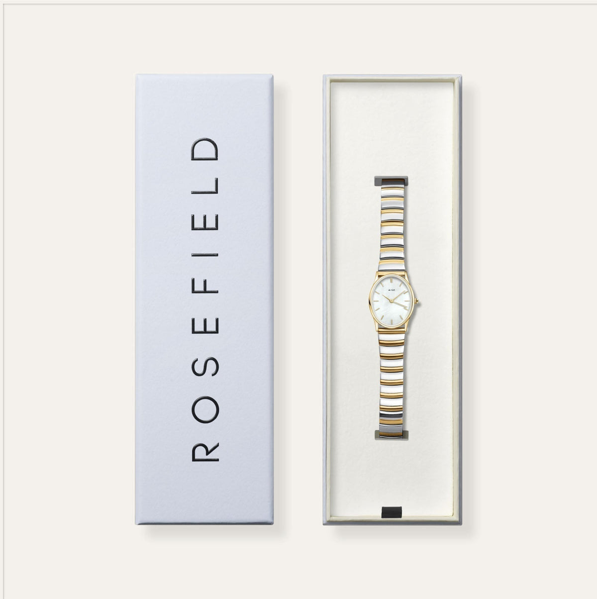 Oval two-tone watch in its gift box