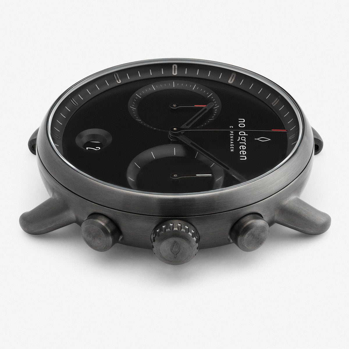 Side profile of the gunmetal case showing the crown flanked by two pushers.