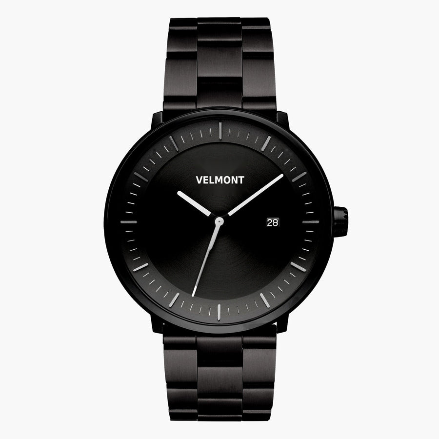 All-black watch with a sunburst dial and date window on a black link bracelet.