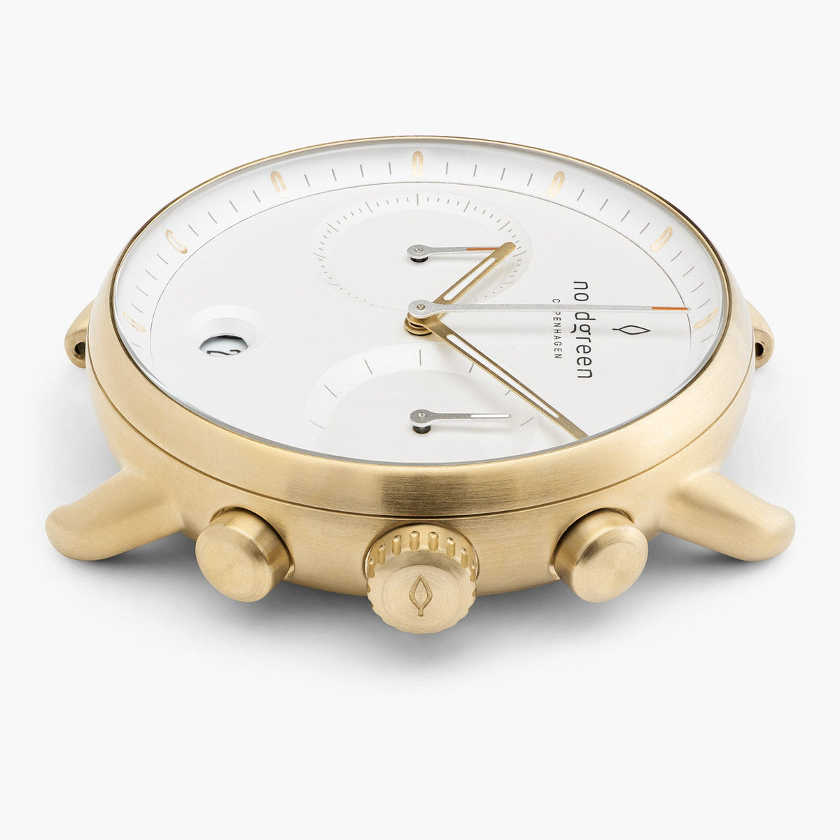 Side profile of the gold-tone case with the crown between two pushers.
