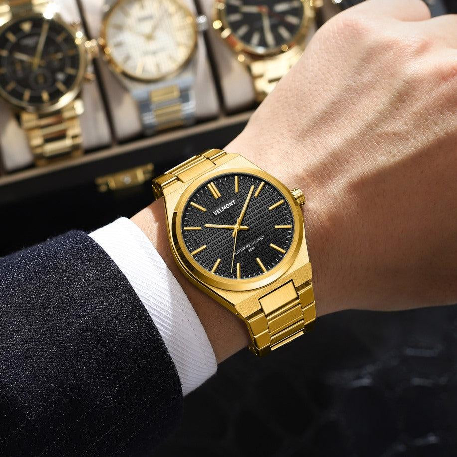 Gold-tone watch on the wrist in a shop