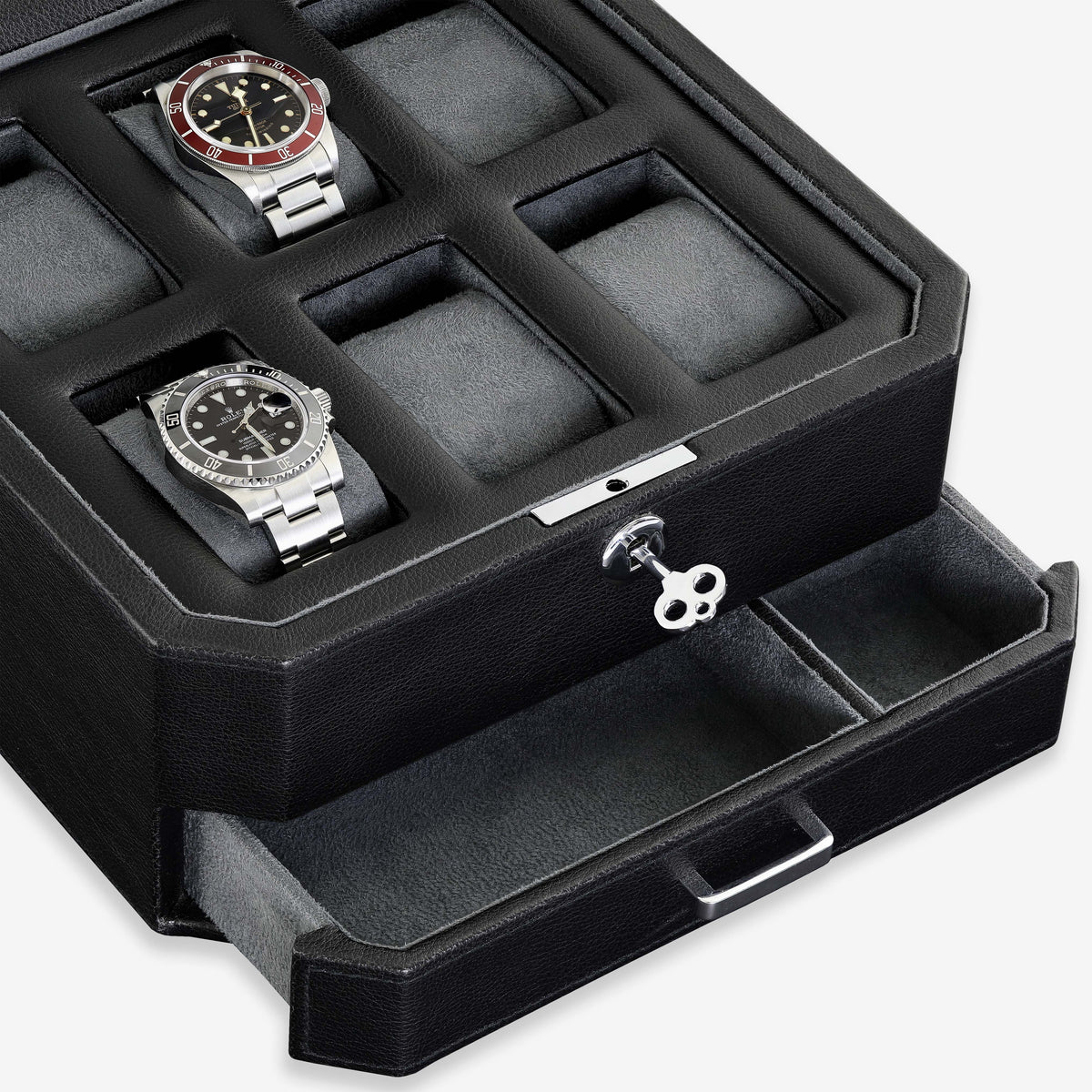 Close-up of watches, key lock and drawer