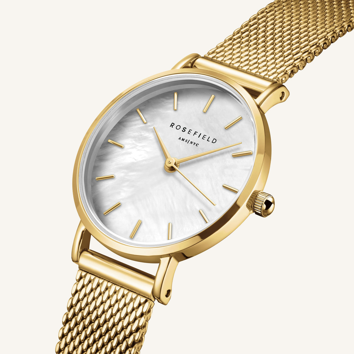 Close-up of the round case and iridescent dial