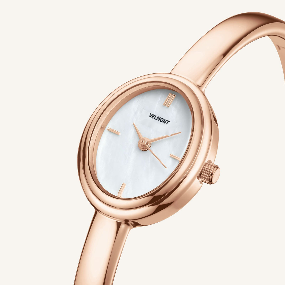 Close-up of the rose gold-tone oval case and iridescent dial