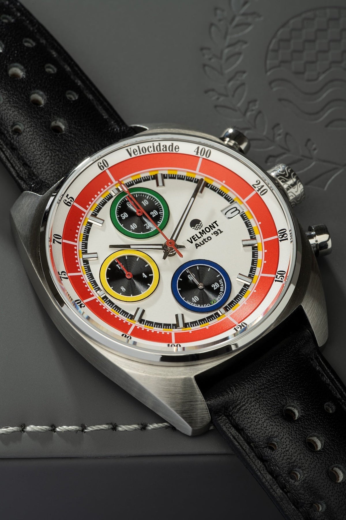 White chronograph on black strap at an angle