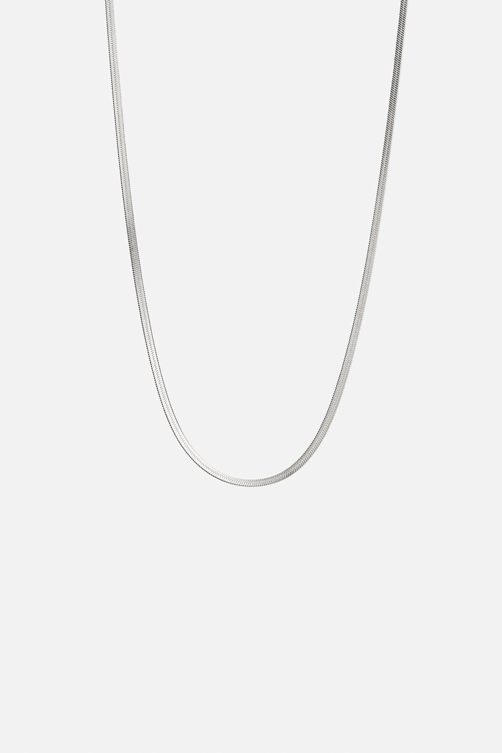 Silver-tone 2 mm herringbone chain necklace, front view on a light background