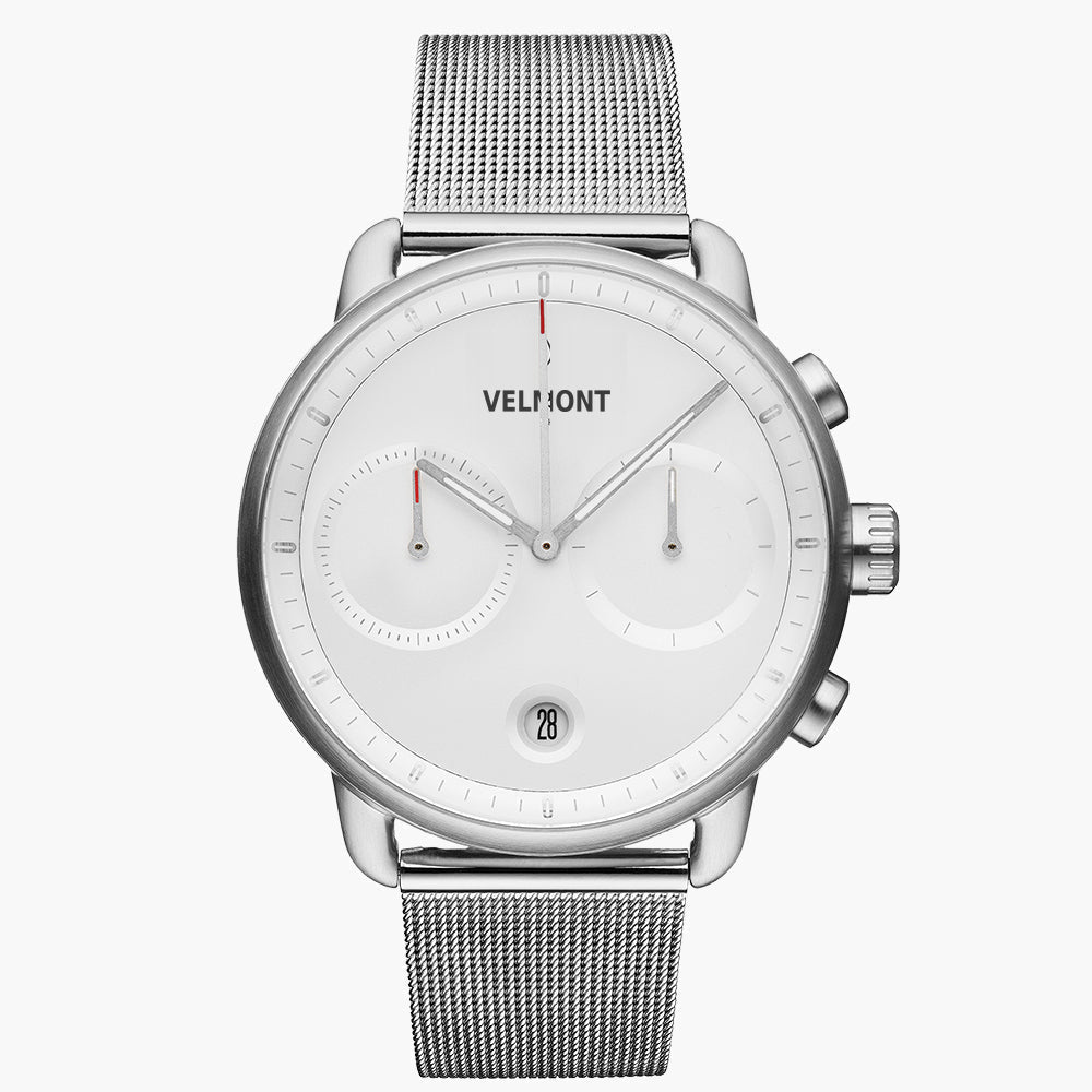 Chronograph-style watch with a white dial on a silver-tone mesh strap, front view.