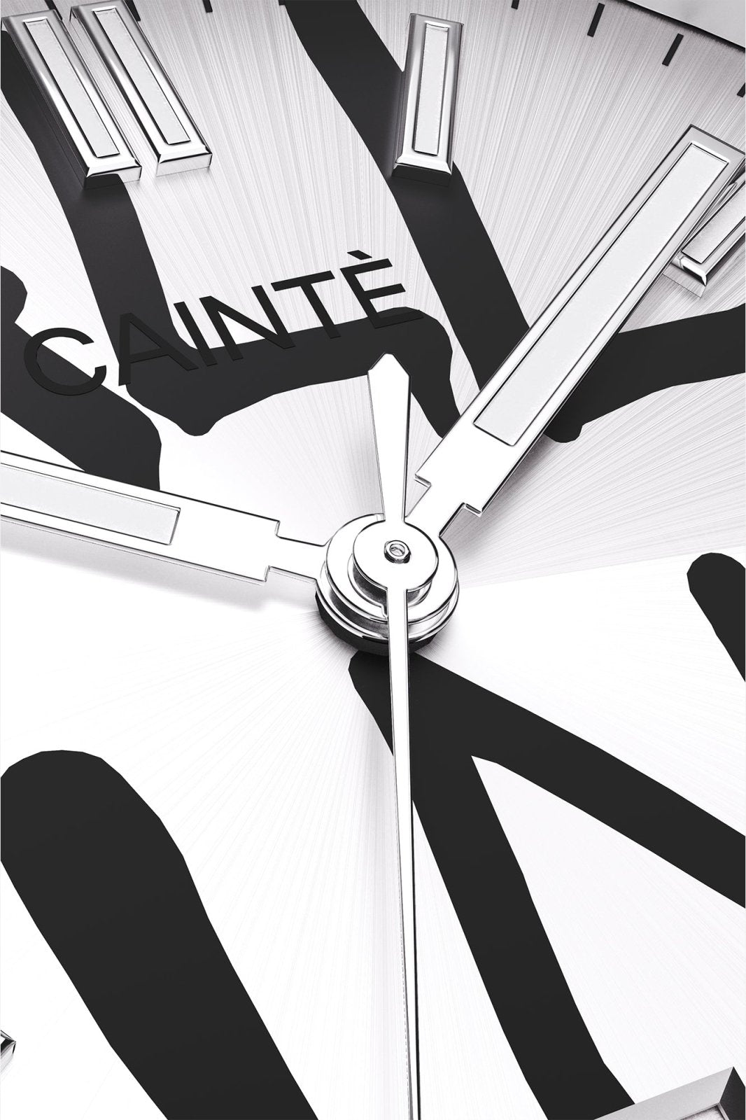 Macro view of the white dial with black graffiti lettering and polished hands