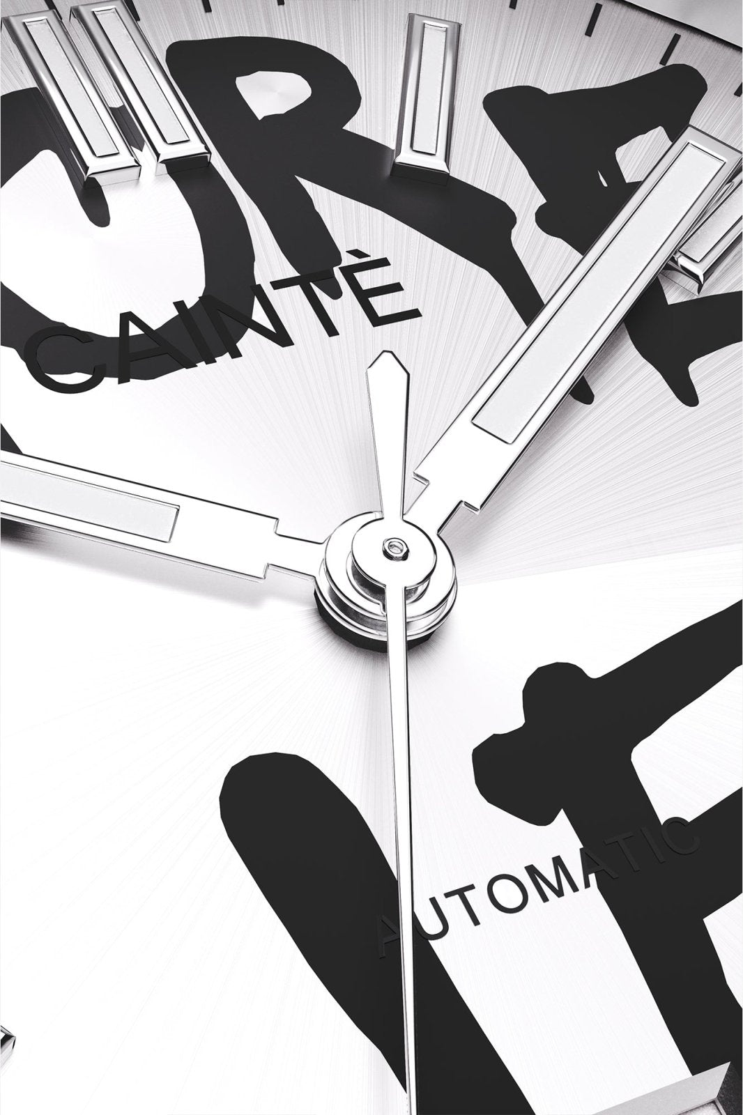 Macro view of the white dial with black graffiti lettering and polished hands