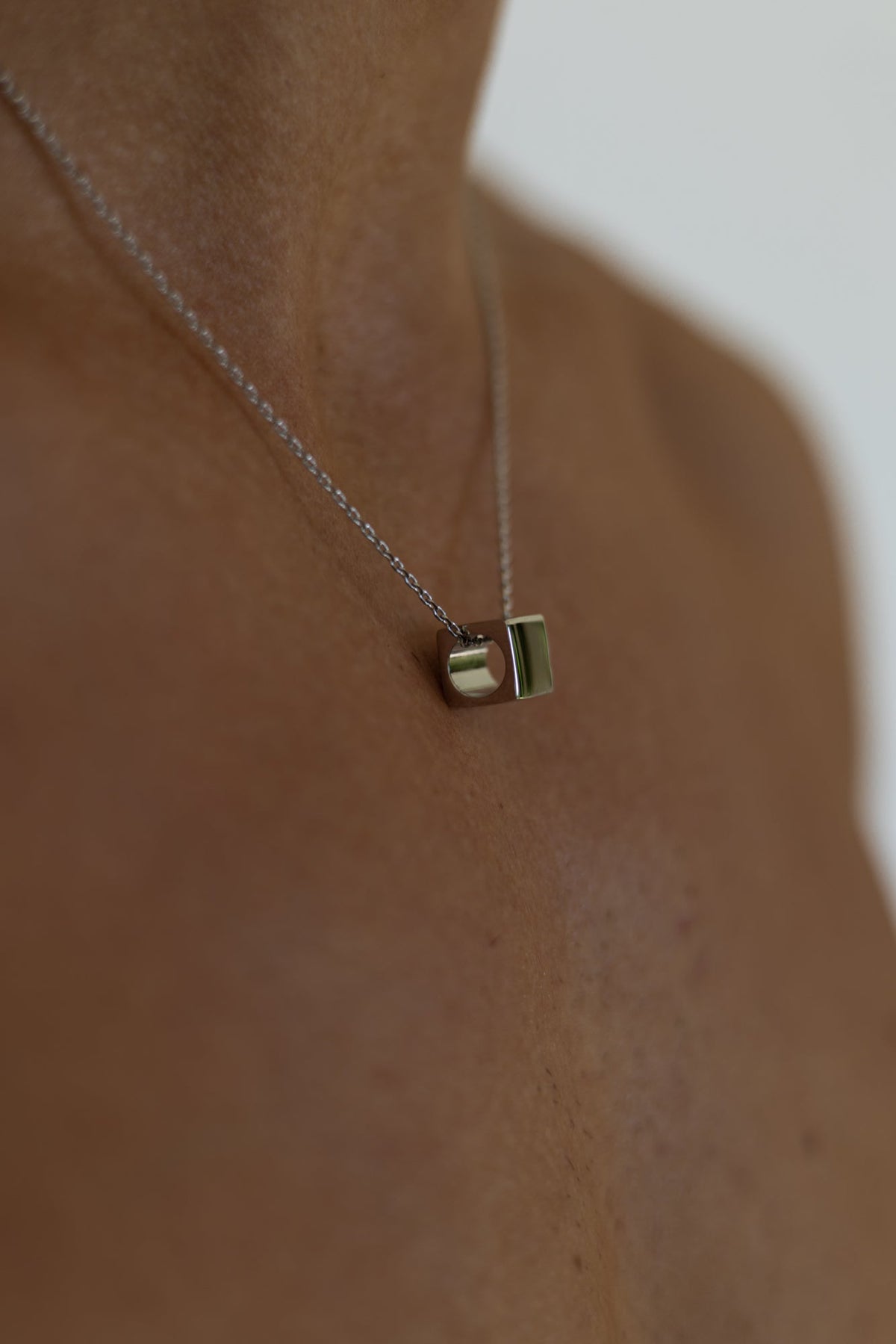 Silver-tone cube pendant necklace, view 7 of 7