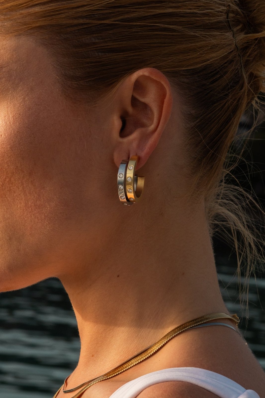 Close-up of the hoop earrings worn on the ear