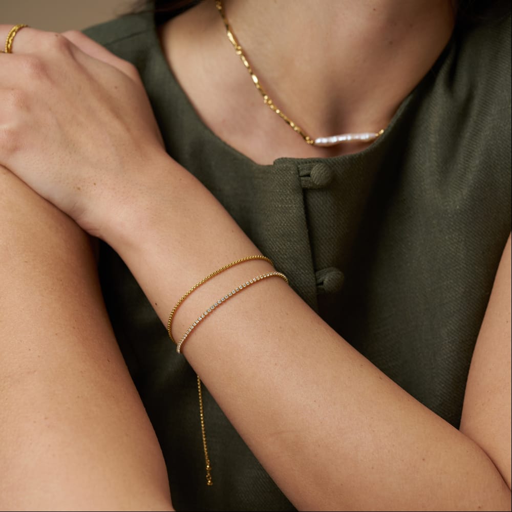 Tennis slider bracelet worn on the forearm