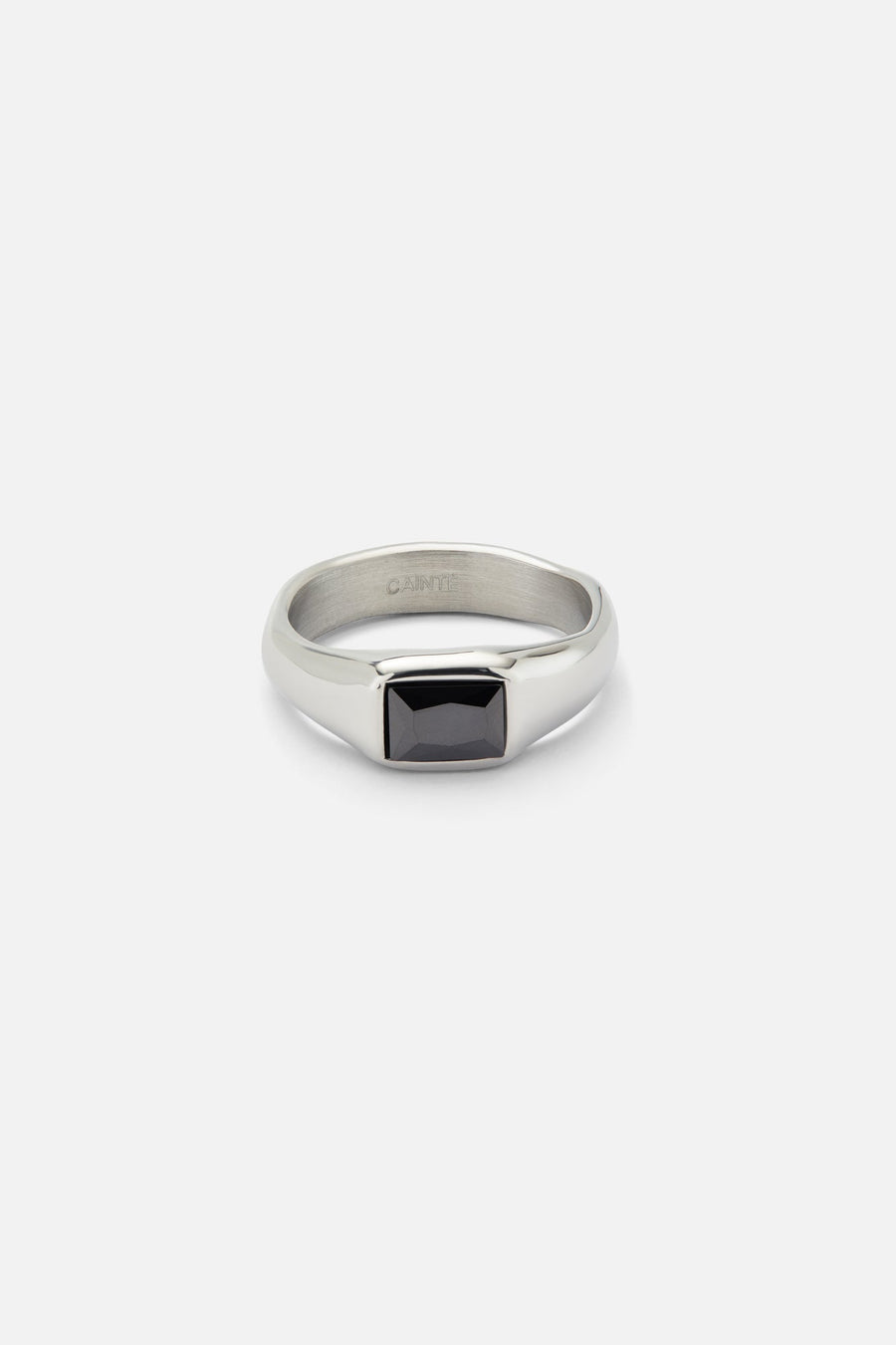 Silver-tone signet ring with a black rectangular stone, front view on a light background