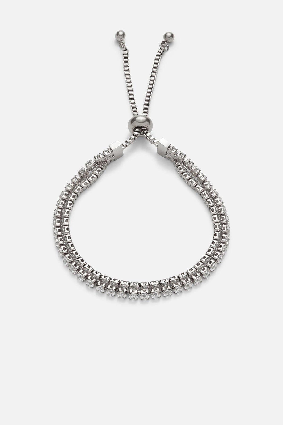 Silver-tone sparkling mesh slider bracelet, front view on a light background
