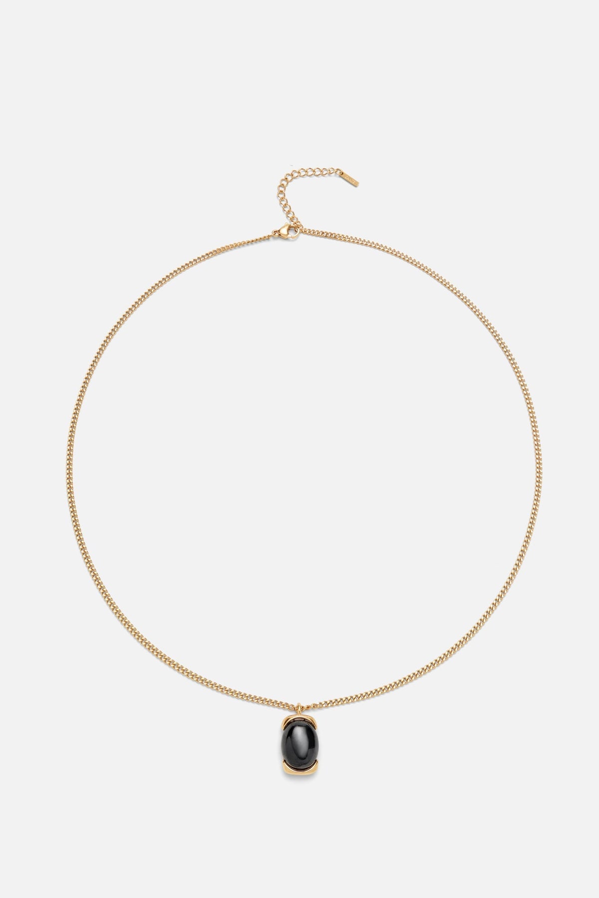 Gold-tone necklace with a black oval pendant, view 3 of 7