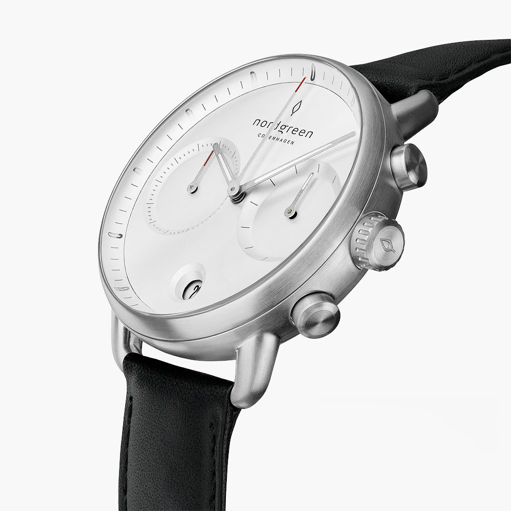 Angled view of the two subdials, pushers and silver-tone case.