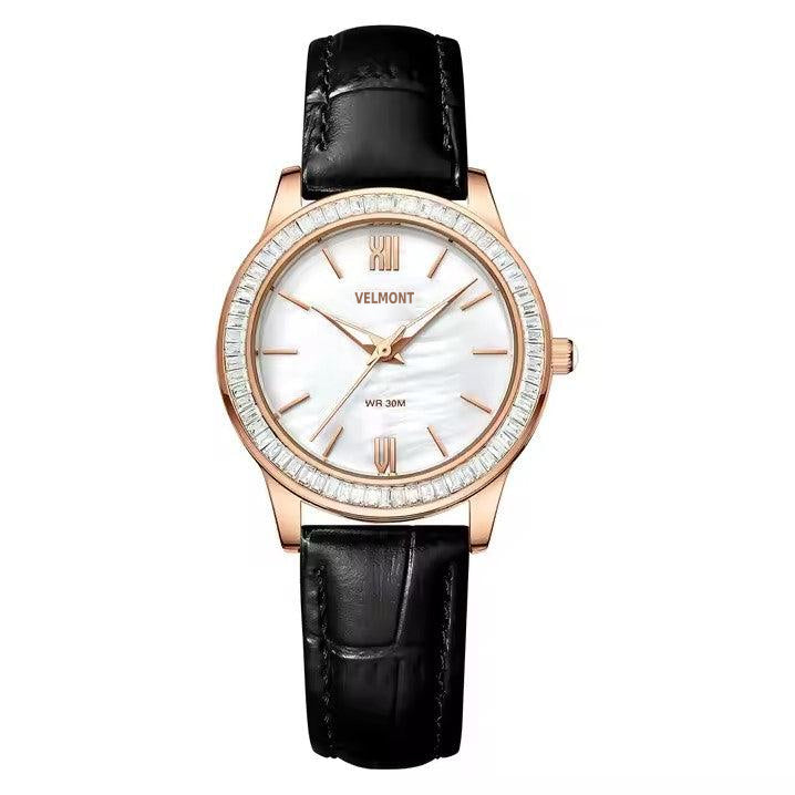 Rose gold-tone watch on black strap