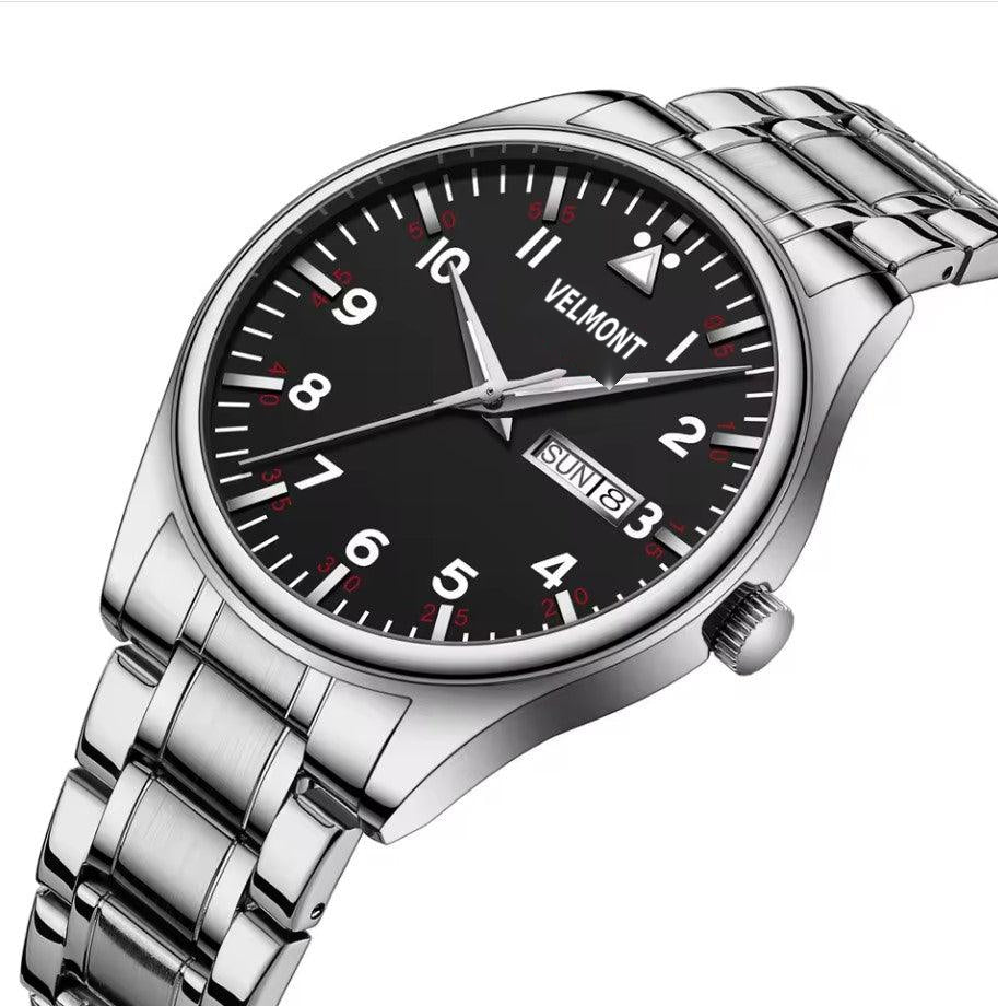 Black dial steel watch at an angle