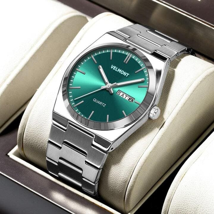 Green dial watch in a presentation box