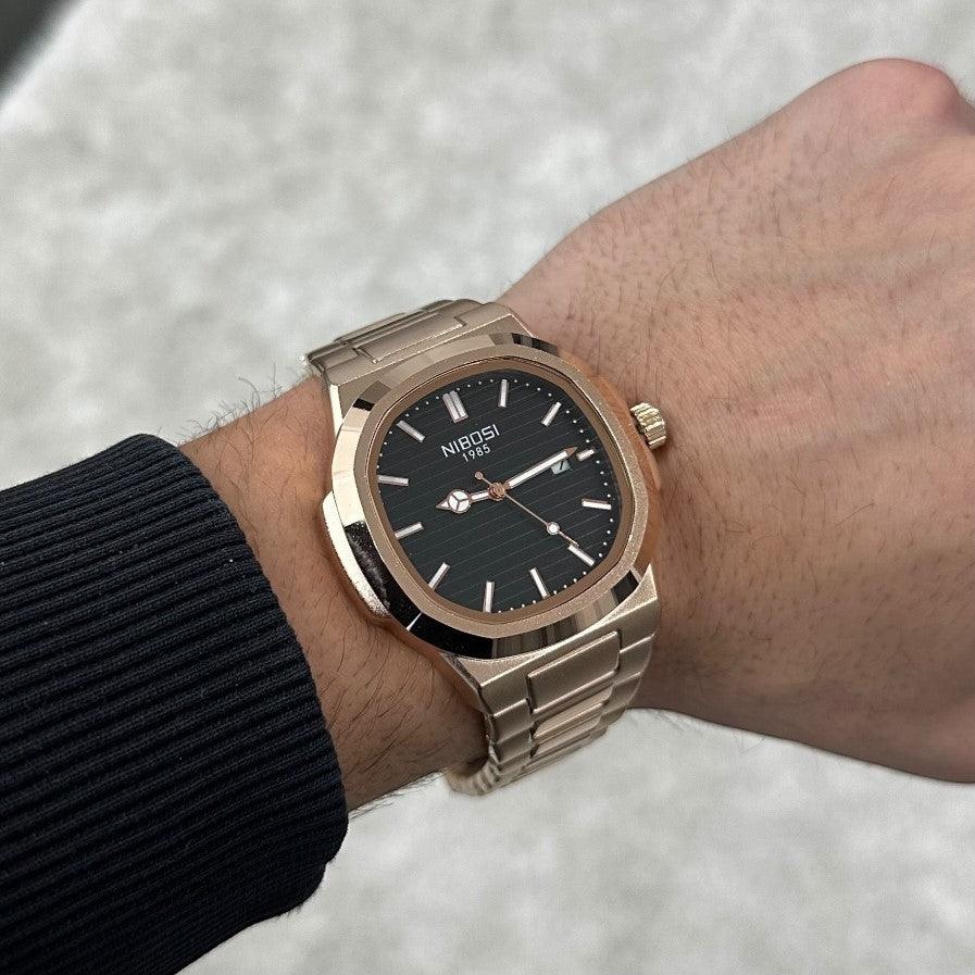 Black dial watch on a wrist, other angle