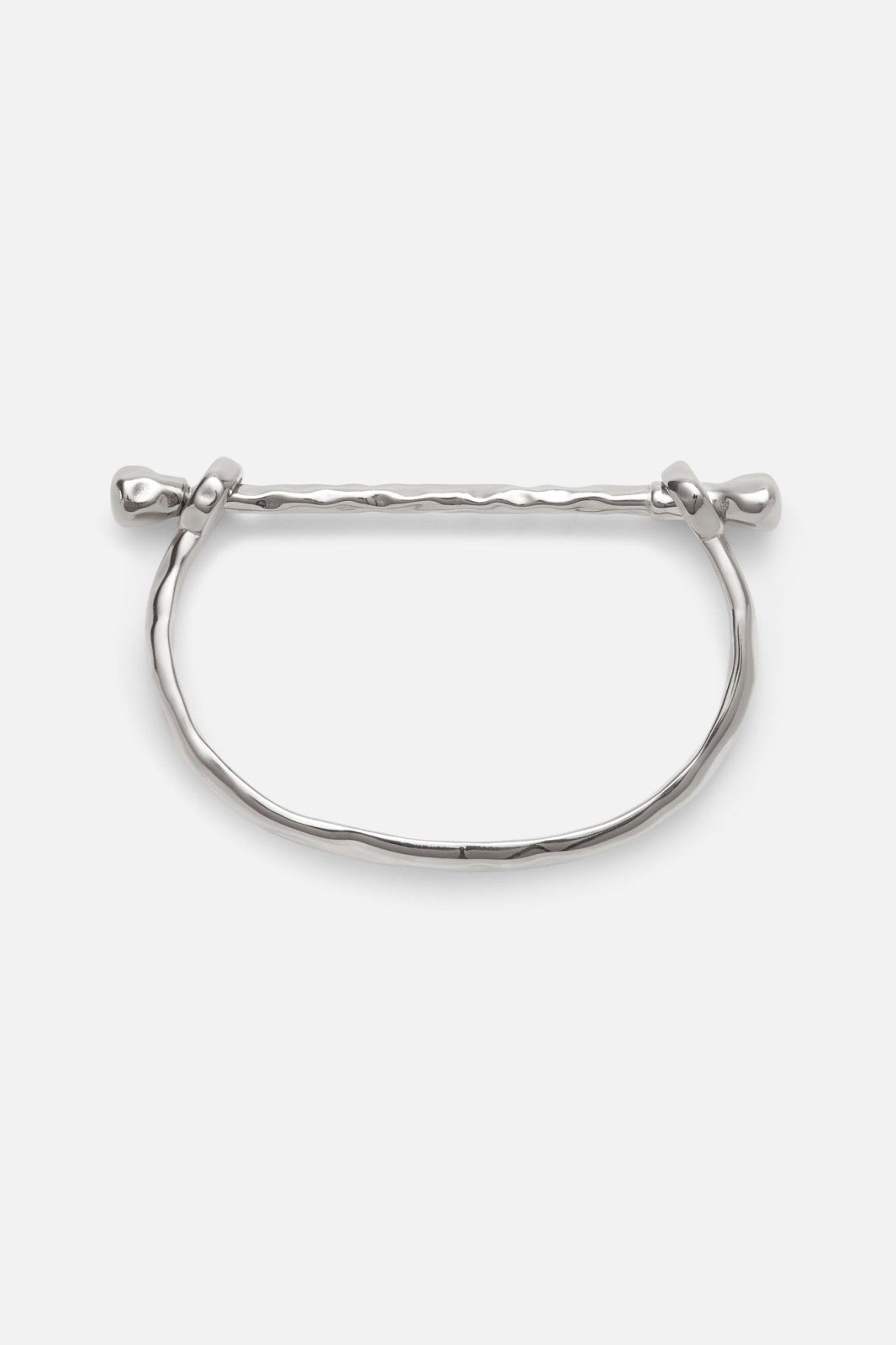 Silver-tone rigid bangle with screw-head ends, front view on a light background