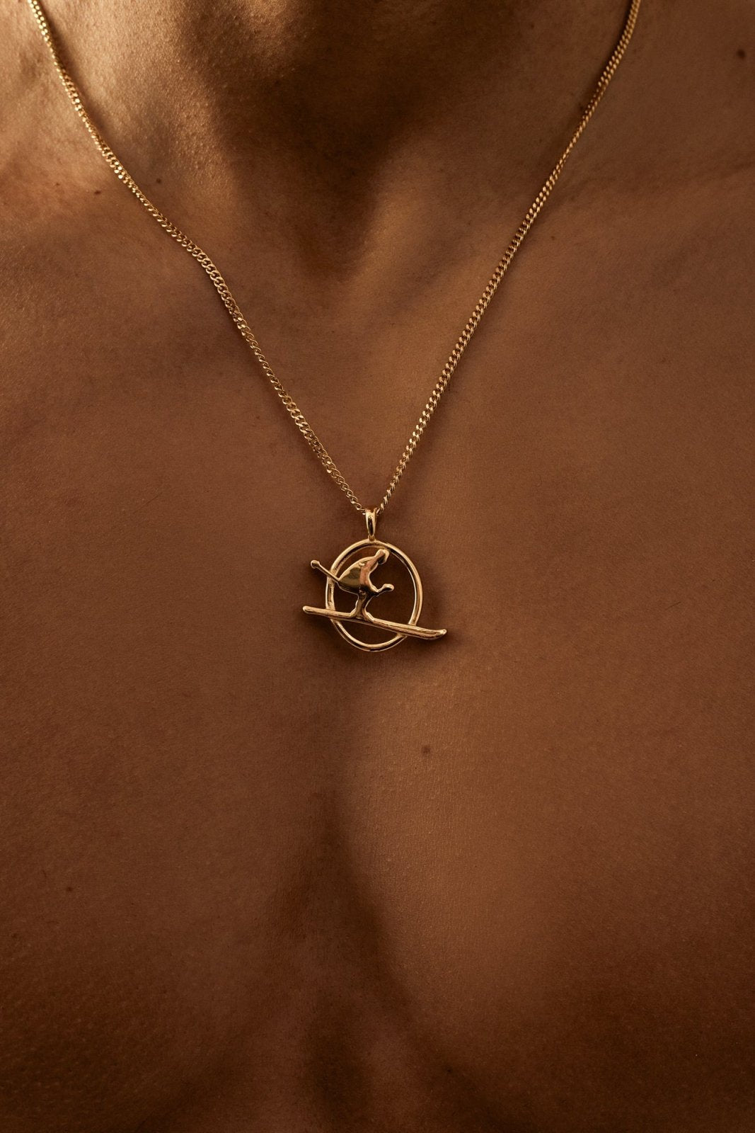 Gold-tone skier pendant necklace, view 4 of 4