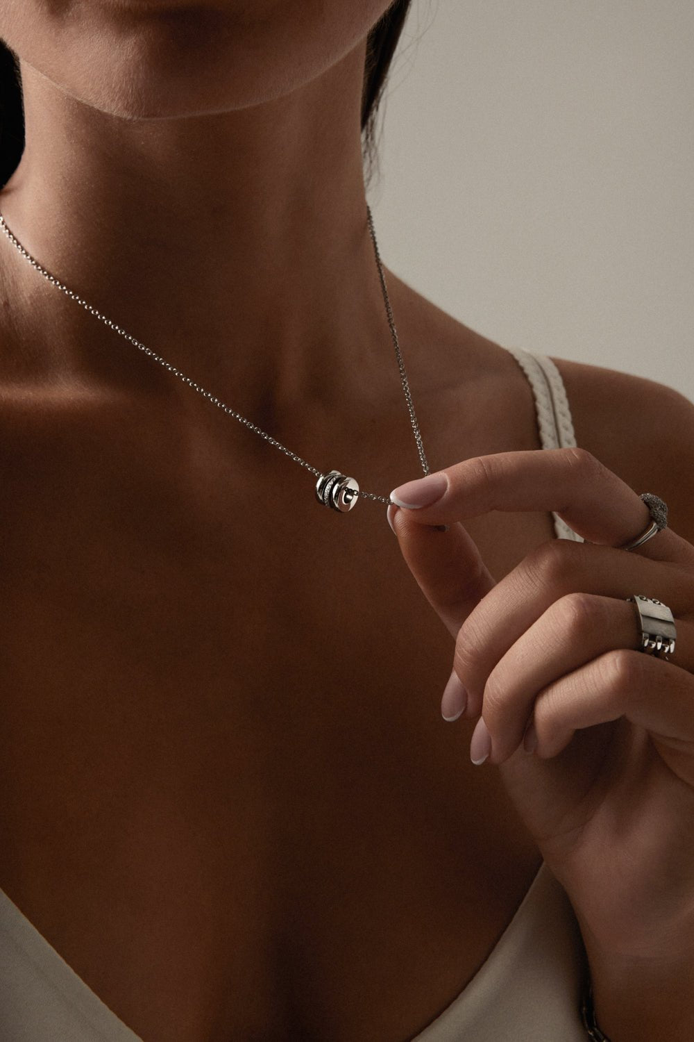 Silver-tone necklace with a cluster of small rings, view 5 of 8