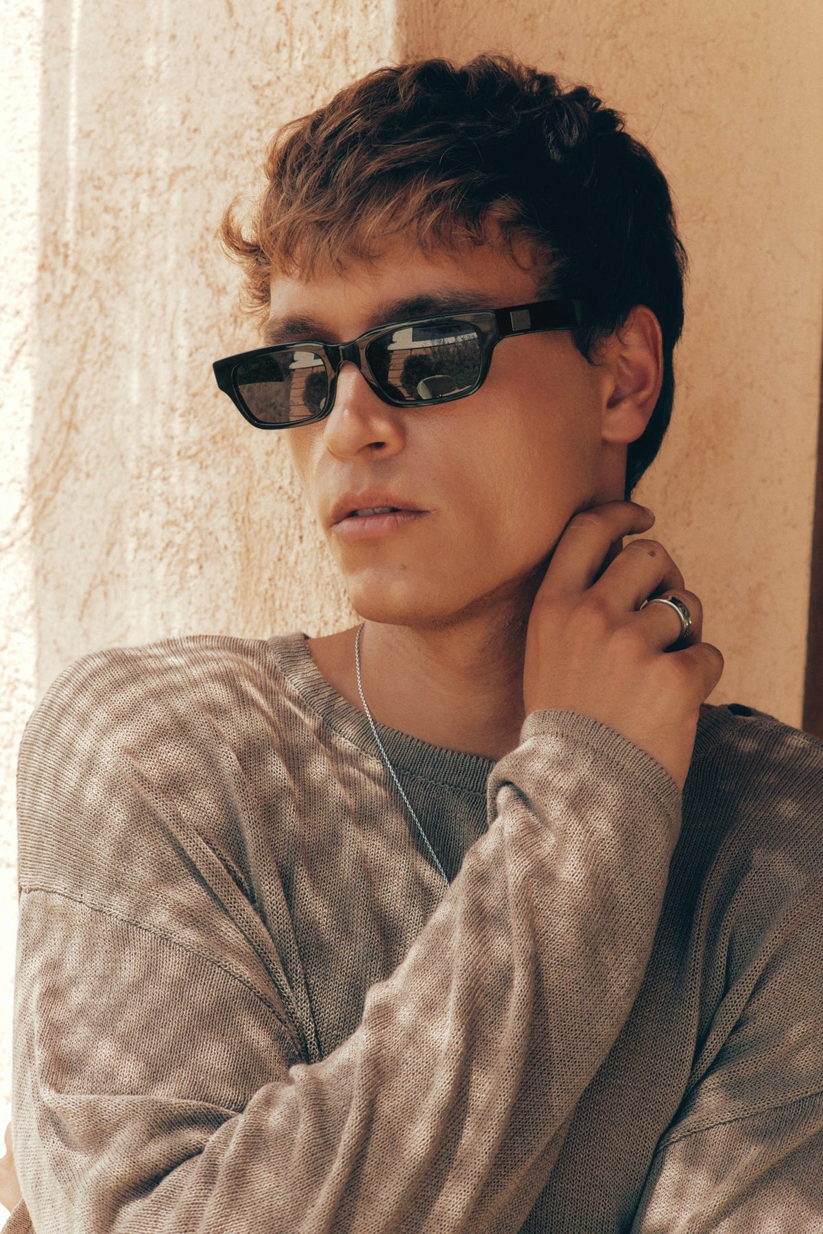 Man wearing the black rectangular sunglasses