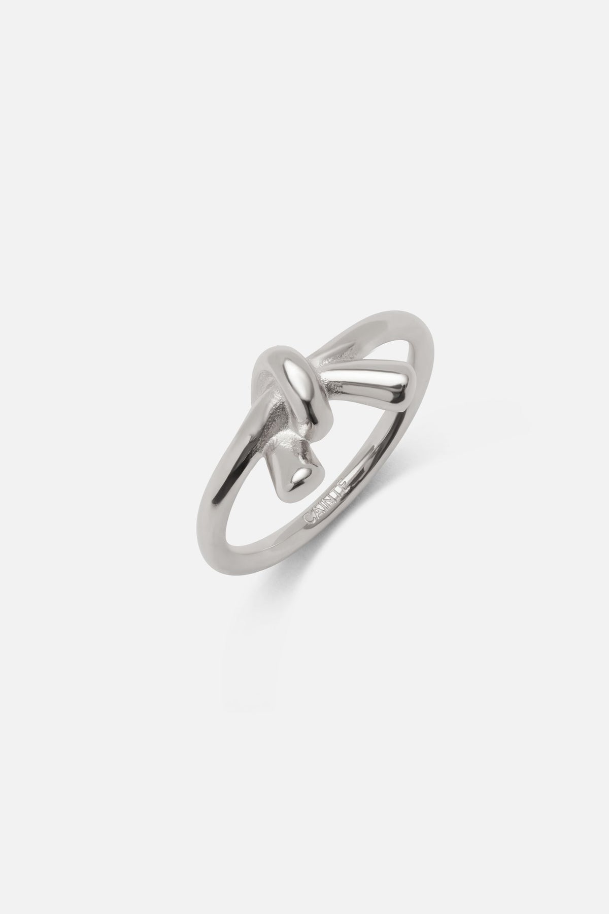Silver-tone knot ring at an angle