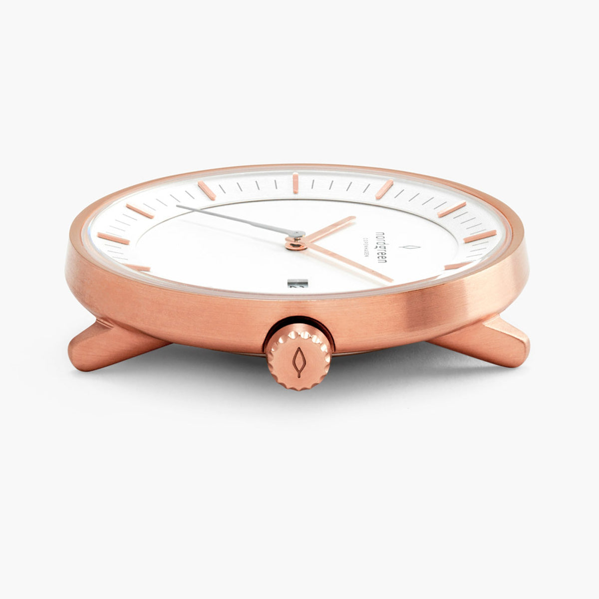 Side profile of the rose gold-tone case with brushed flanks.