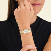 Octagon watch worn with a black top