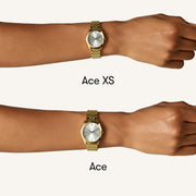 Size comparison of two round watches on a wrist